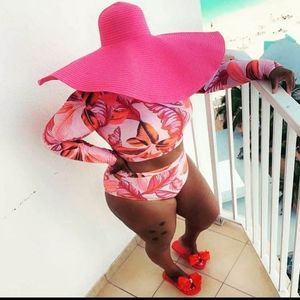 two peice bathing suit and floppy hat